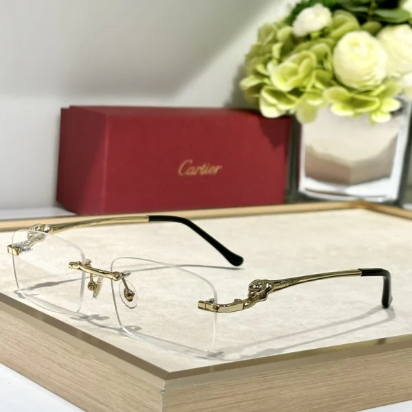 Model wearing Cartier Panthère de Cartier sunglasses in natural daylight, accentuating sculptural feline design