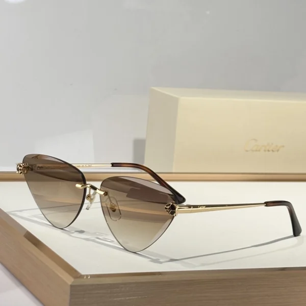 Close-up of Cartier Panthère de Cartier sunglasses showcasing the iconic panther motif in polished metal