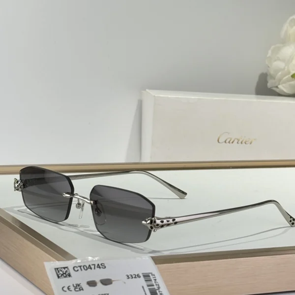 Cartier Panthère de Cartier sunglasses displayed with red Cartier box and dust bag, highlighting elegance and brand heritage