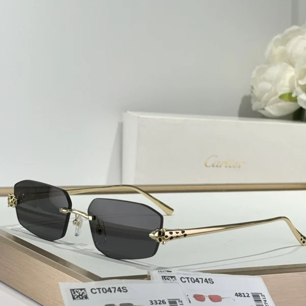 Side profile of Cartier Panthère de Cartier sunglasses with curved arms and bold cat-eye silhouette in polished black