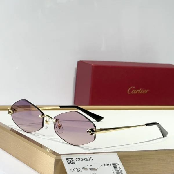 Cartier Panthère de Cartier sunglasses featuring sculpted panther motif on gold-tone temples and dark lenses