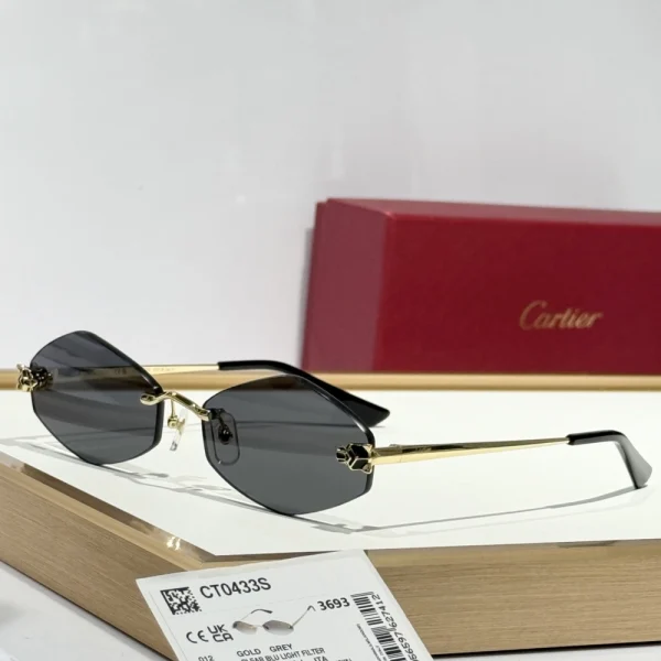 Cartier Panthère sunglasses resting on red Cartier box, emphasizing elegance and brand identity