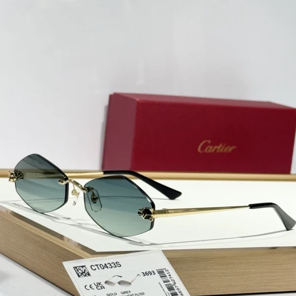 Cartier Panthère sunglasses photographed on marble tabletop, capturing shadows and sculptural details