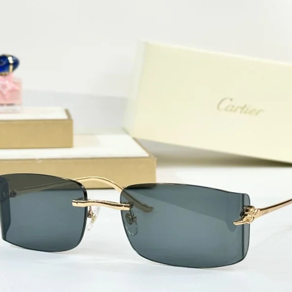 Cartier Panthère de Cartier sunglasses in shiny gold, featuring sculpted panther detail on temples
