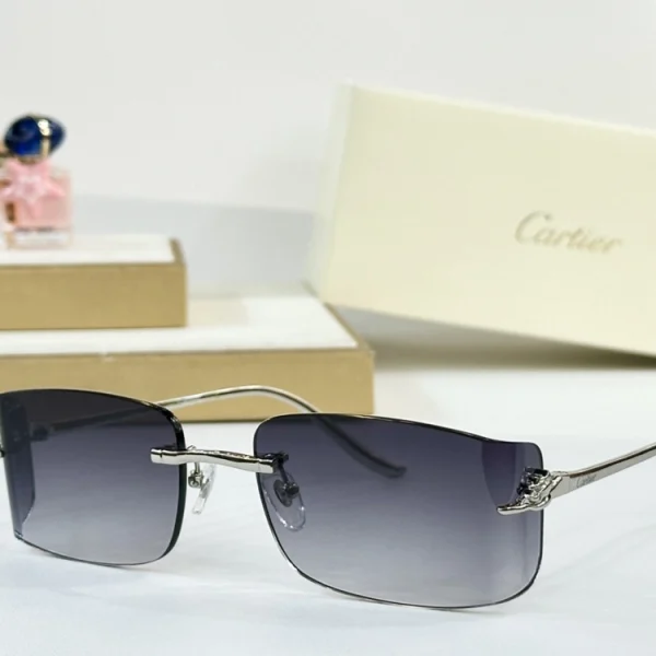 Close-up shot of Panthère de Cartier sunglasses showcasing feline motif with jeweled eyes