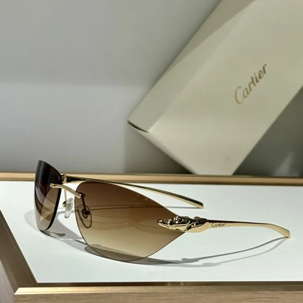 Side angle of Cartier Panthère de Cartier sunglasses showing the gold panther detail wrapped around the temple hinge