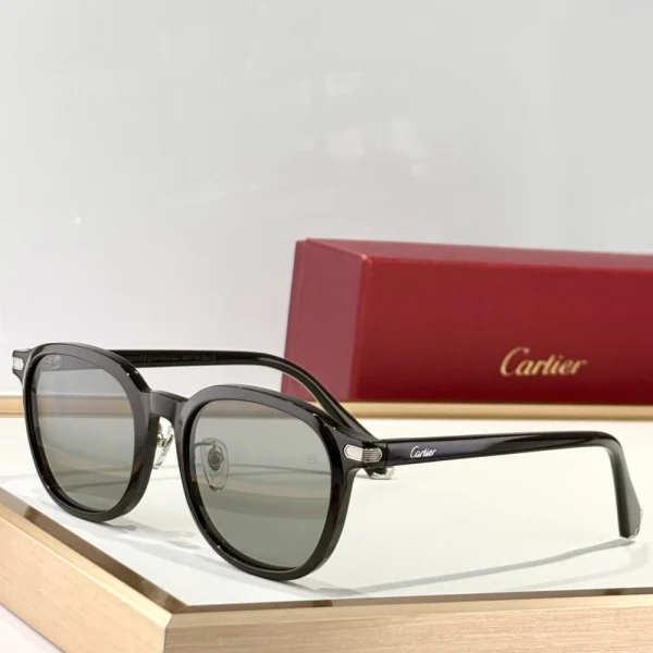 Close-up of Cartier Première sunglasses showing beveled frame edges and signature design details