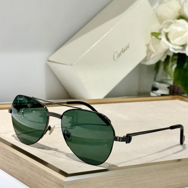 Cartier Première de Cartier sunglasses featuring a sleek frame and refined detailing, styled with a minimalist beige background