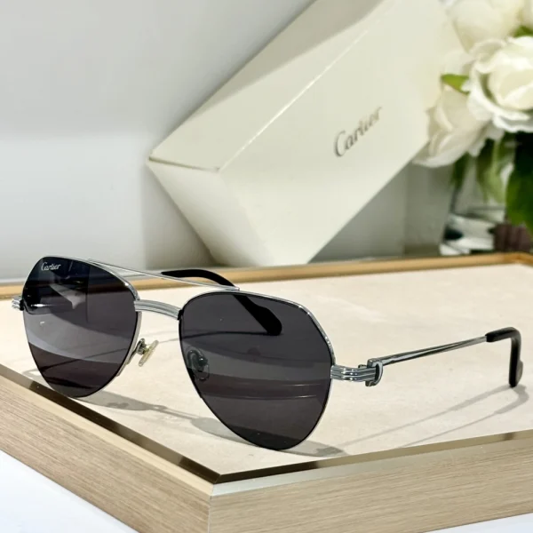 Cartier Première de Cartier sunglasses worn by model in daylight, emphasizing timeless elegance and high-fashion appeal