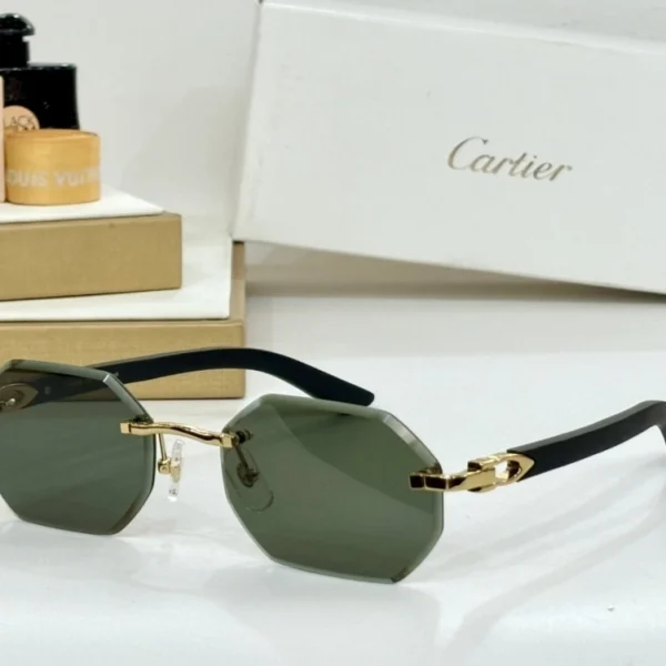 Cartier Sunglasses C Allongé de Cartier motif in glossy black with metallic arms, placed beside iconic red Cartier box