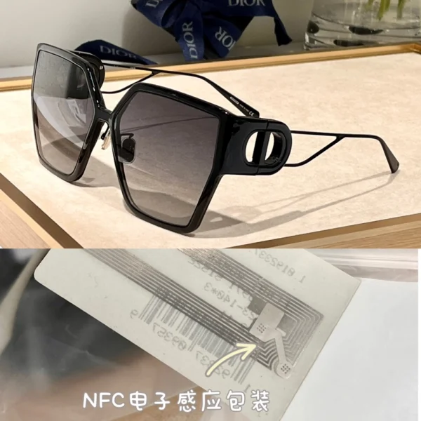 Christian Dior 30Montaigne BU sunglasses with oversized black square frame and gradient lenses, styled on a clean white tabletop