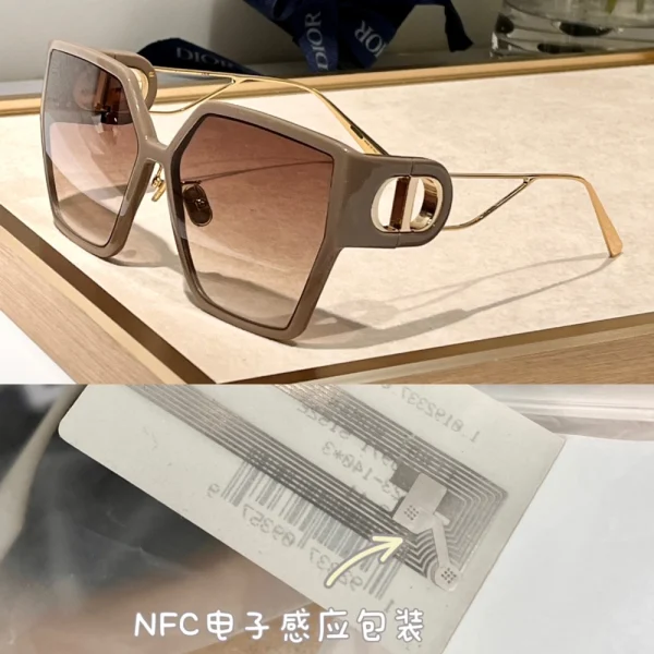 Elegant Christian Dior 30Montaigne BU sunglasses placed beside branded Dior case and cleaning cloth