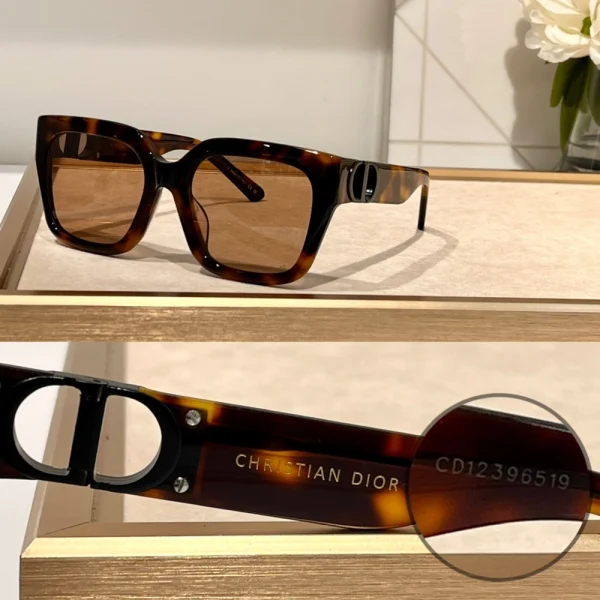 Christian Dior 30Montaigne S10F sunglasses with oversized square black frame and gradient lenses, styled on a clean white tabletop
