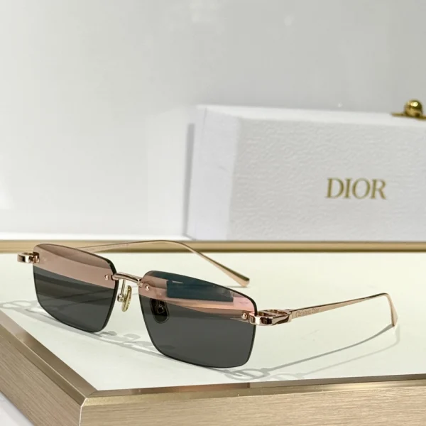 Christian Dior CDior S4U sunglasses with modern square frame and gradient lenses, featuring engraved Dior logo on slim temples, styled on a clean white tabletop