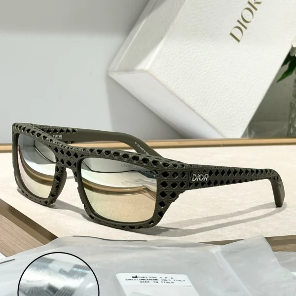 Luxury Dior Dior3D S1I sunglasses placed diagonally on a marble surface under natural daylight