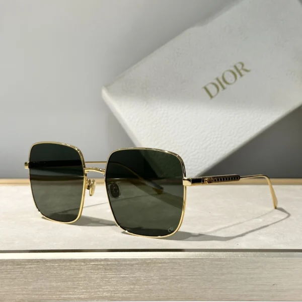 Close-up of Dior DiorCannage S1U sunglasses highlighting signature Cannage motif on bold glossy temples