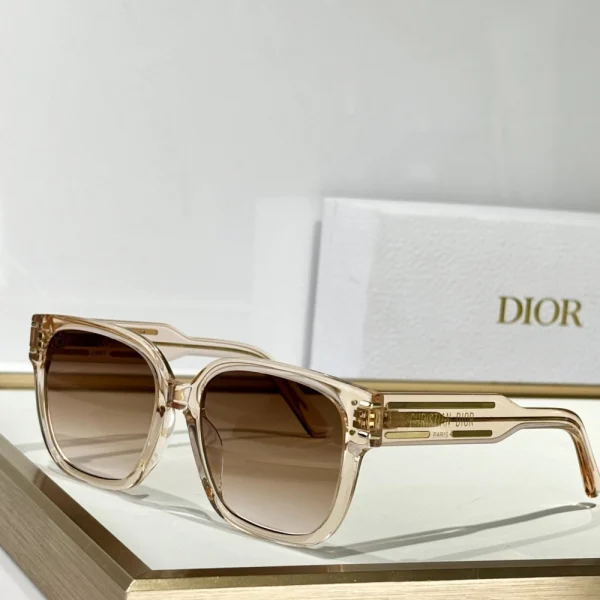 Luxury Dior DiorSignature S7F sunglasses placed diagonally on marble surface under soft natural lighting