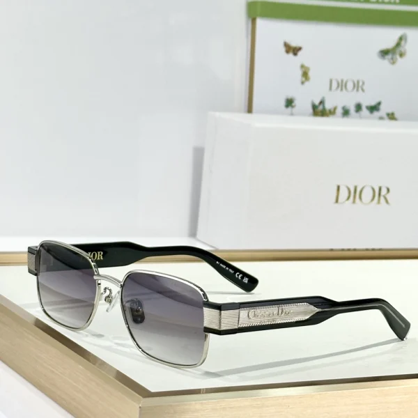 Christian Dior Label S2U sunglasses with sleek rectangular black frame and dark lenses, styled on a clean white tabletop