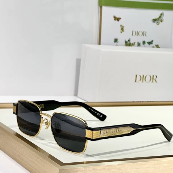Luxury Dior Label S2U sunglasses placed diagonally on marble surface under natural daylight
