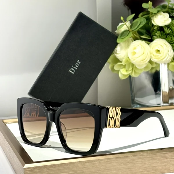High-fashion Christian Dior MissDior S2F sunglasses styled with minimalist jewelry for a chic couture look