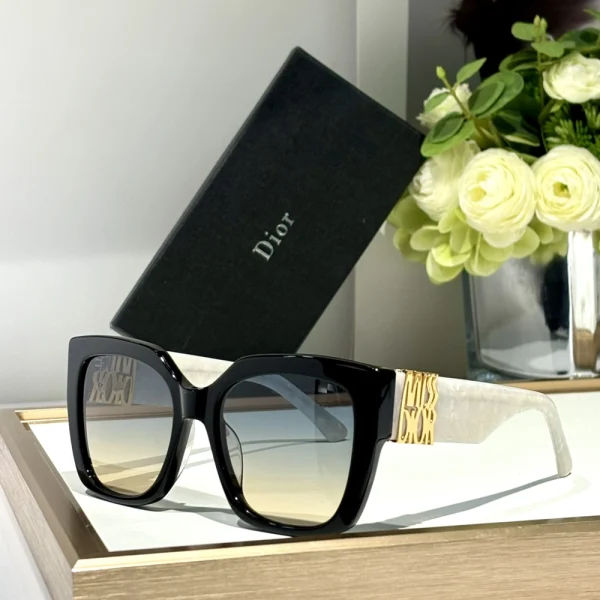 Oversized Dior MissDior S2F sunglasses photographed on beige velvet fabric, emphasizing bold yet feminine design