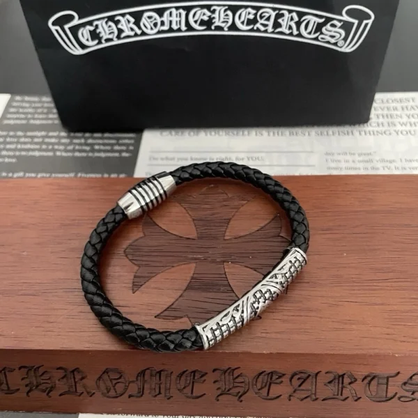 Black Chrome Hearts bracelet with signature cross or floral motifs, combining luxury with edgy streetwear style.