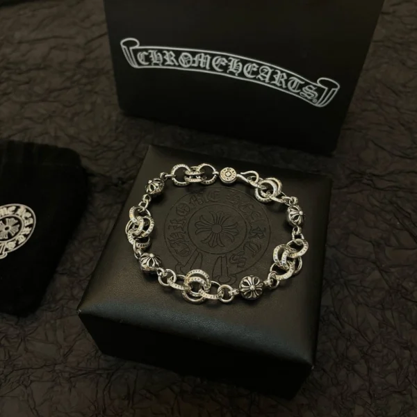 Chrome Hearts silver bracelet featuring cross ball links and signature gothic design in sterling silver.