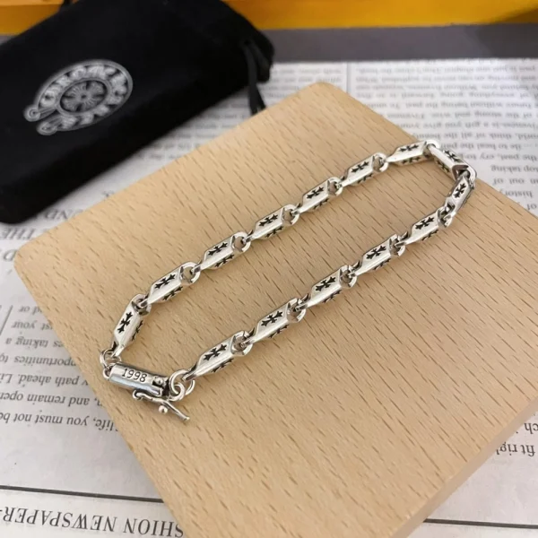 Iconic Chrome Hearts Cross bracelet combining detailed silverwork and timeless gothic aesthetics.