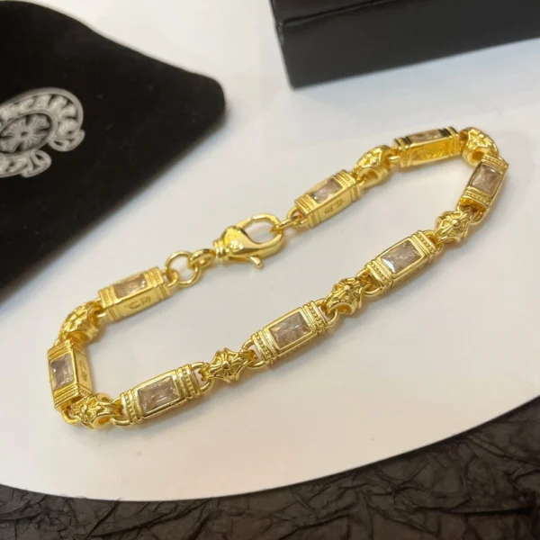 High-end Chrome Hearts bracelets in yellow or white gold, combining bold motifs with premium finishes.