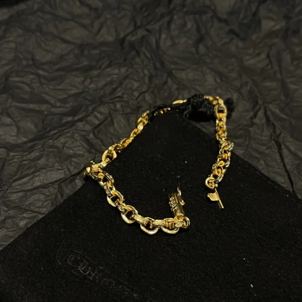 18K gold Chrome Hearts bracelet with bold detailing, combining edgy streetwear style and fine jewelry.