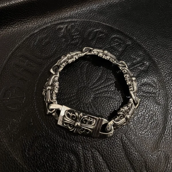 Chrome Hearts Keeper bracelet in sterling silver featuring bold gothic engravings and classic link design.