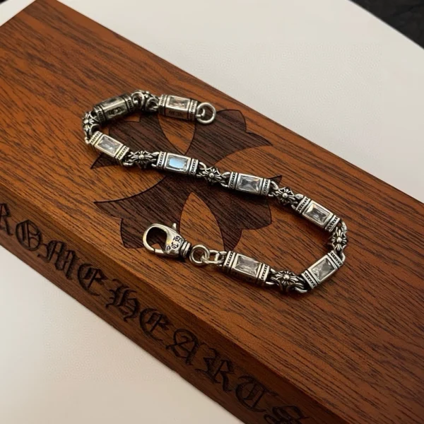 Elegant Chrome Hearts-style silver bracelets combining bold motifs with high-end handcrafted silverwork.