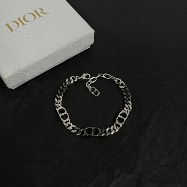 Dior CD Icon chain link bracelet with bold gold-tone finish and signature CD charm