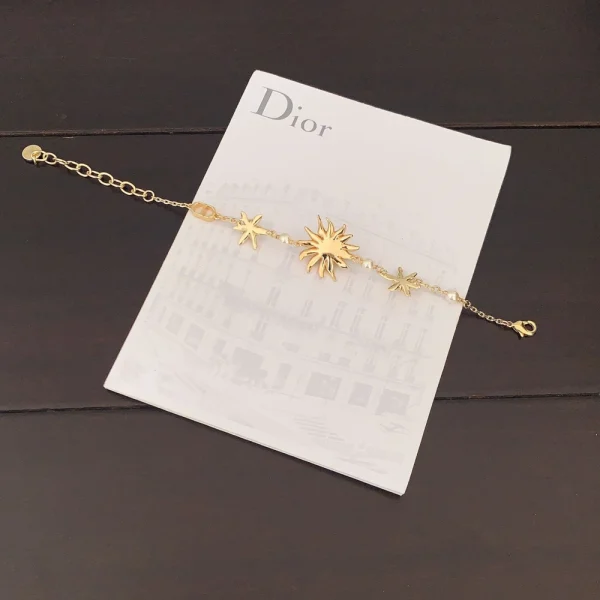 Close-up of Dior Chardons bracelet featuring sculpted thistle motifs