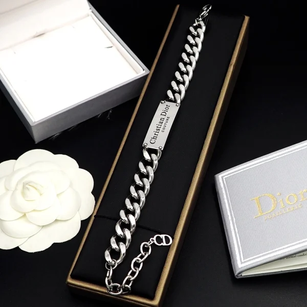 Close-up of Dior Couture silver bracelet featuring refined details