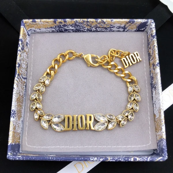 Dior gold bracelet with crystal embellishments and elegant design