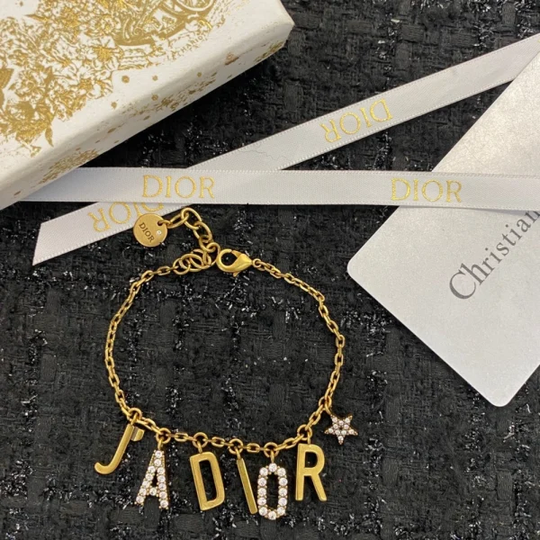 Dior J’adior bracelet with gold-tone metal and bold logo design