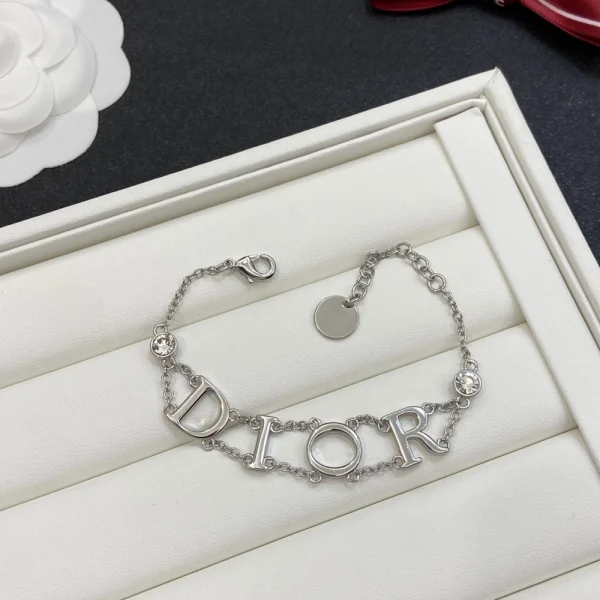 Dior logo bracelet with gold-tone chain and signature CD charm
