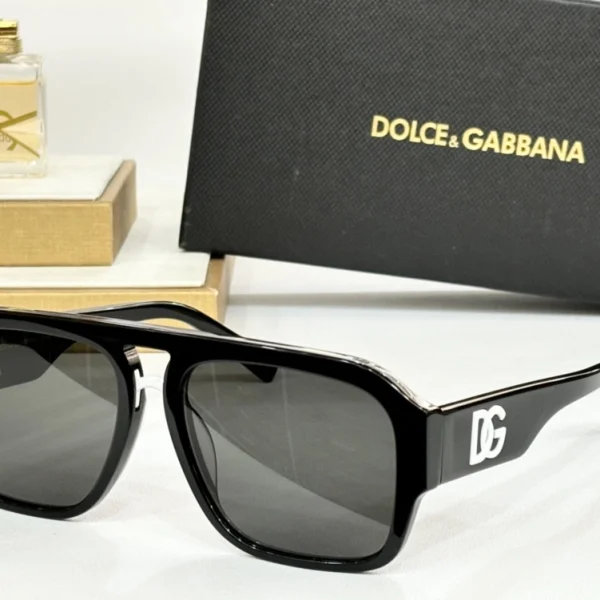 Dolce & Gabbana DG Crossed Sunglasses with sleek frames and sophisticated detailing