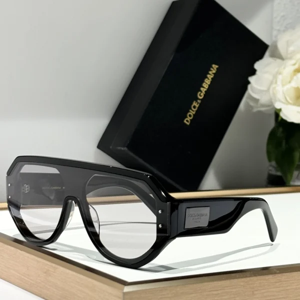 Elegant Dolce & Gabbana DG Logo Plaque Sunglasses featuring iconic Italian design