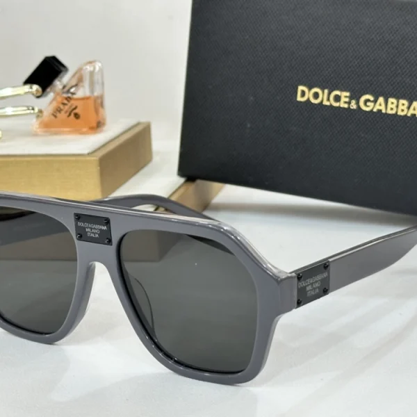Stylish Dolce & Gabbana DG Plaque Sunglasses featuring sleek frames and modern design