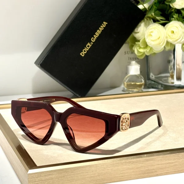 Elegant Dolce & Gabbana DG Precious sunglasses featuring ornate frame details and UV protection lenses