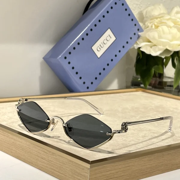 Gucci geometric-frame sunglasses featuring angular design and bold lens shape