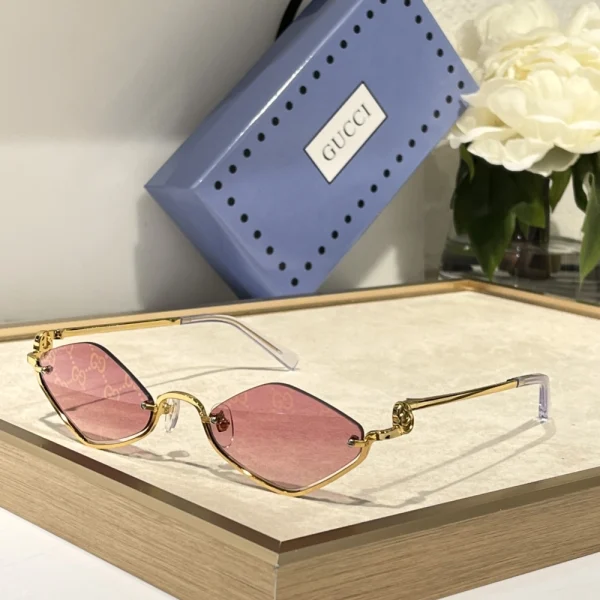 Gucci geometric sunglasses photographed in daylight, highlighting bold lines and premium materials