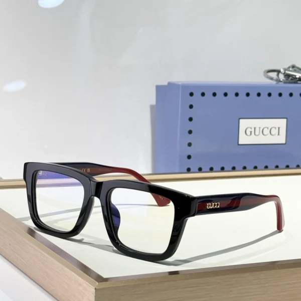 Angled view of Gucci rectangular sunglasses showing clean frame lines and dark tinted lenses