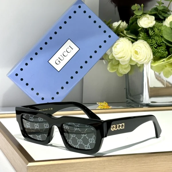 Gucci GG-SG55 rectangular-frame sunglasses with sleek silhouette and glossy black acetate finish