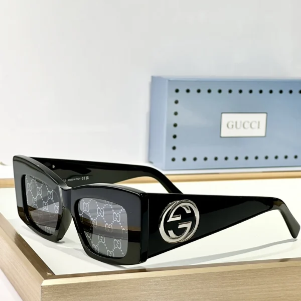 High-fashion Gucci square sunglasses with structured shape and premium glossy finish