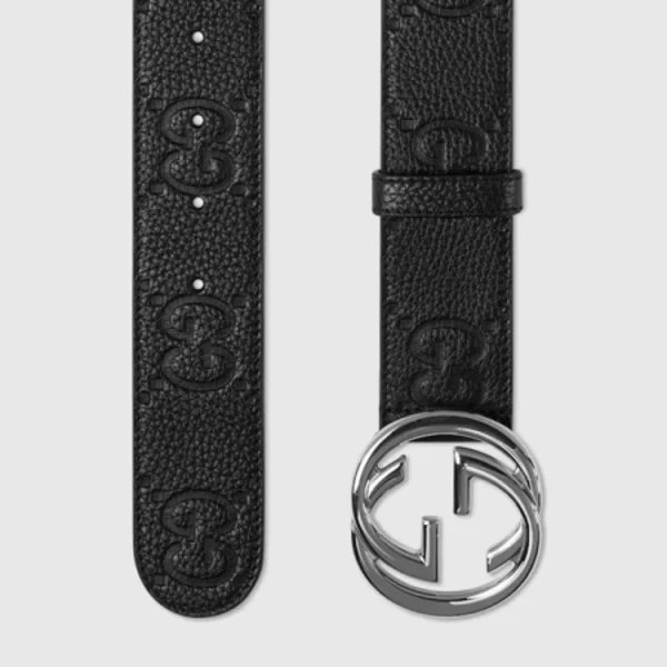 Close-up of Gucci Wide Leather Belt highlighting bold gold Interlocking G buckle detail