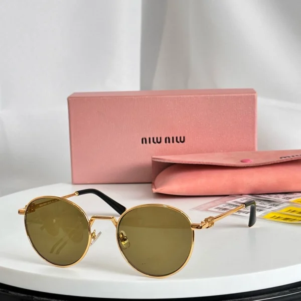 Front view of Miu Miu MM-SG62 sunglasses with signature logo detail and modern frame design