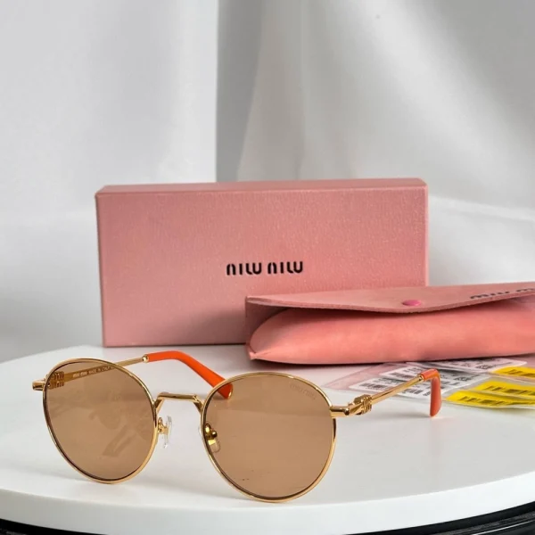 Miu Miu MM-SG63 logo sunglasses showcasing oversized silhouette and fashion-forward style
